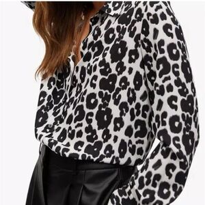 NWT Black and white leopard print button down long sleeve top with collar